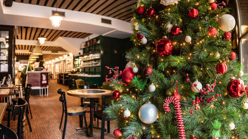 Photo of restaurant inside filled with festive decorations
