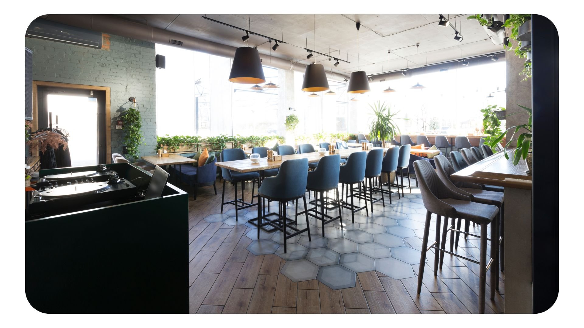 Empty restaurant with tables laid out ready