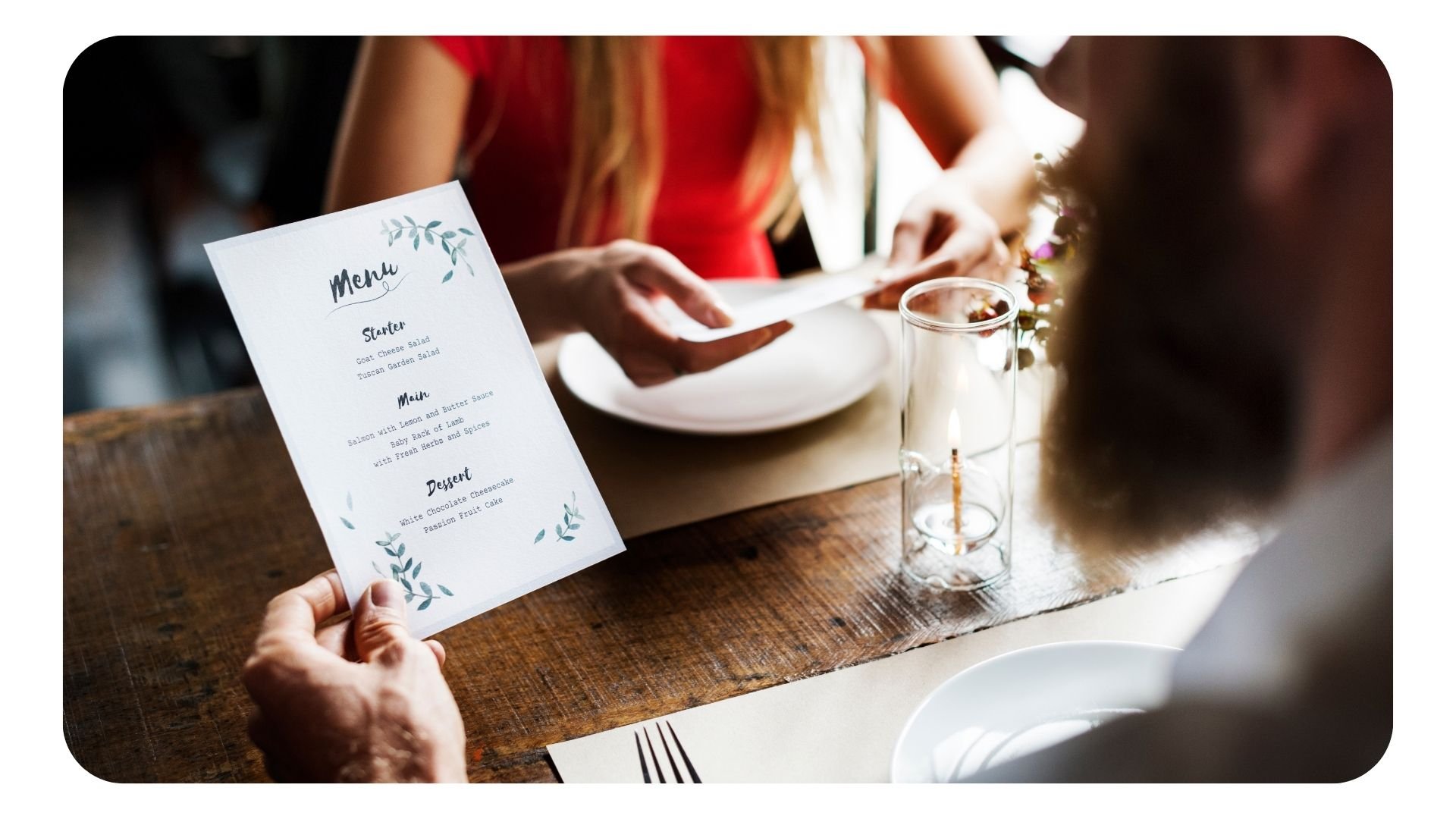 Diners reviewing the menu in a restaurant