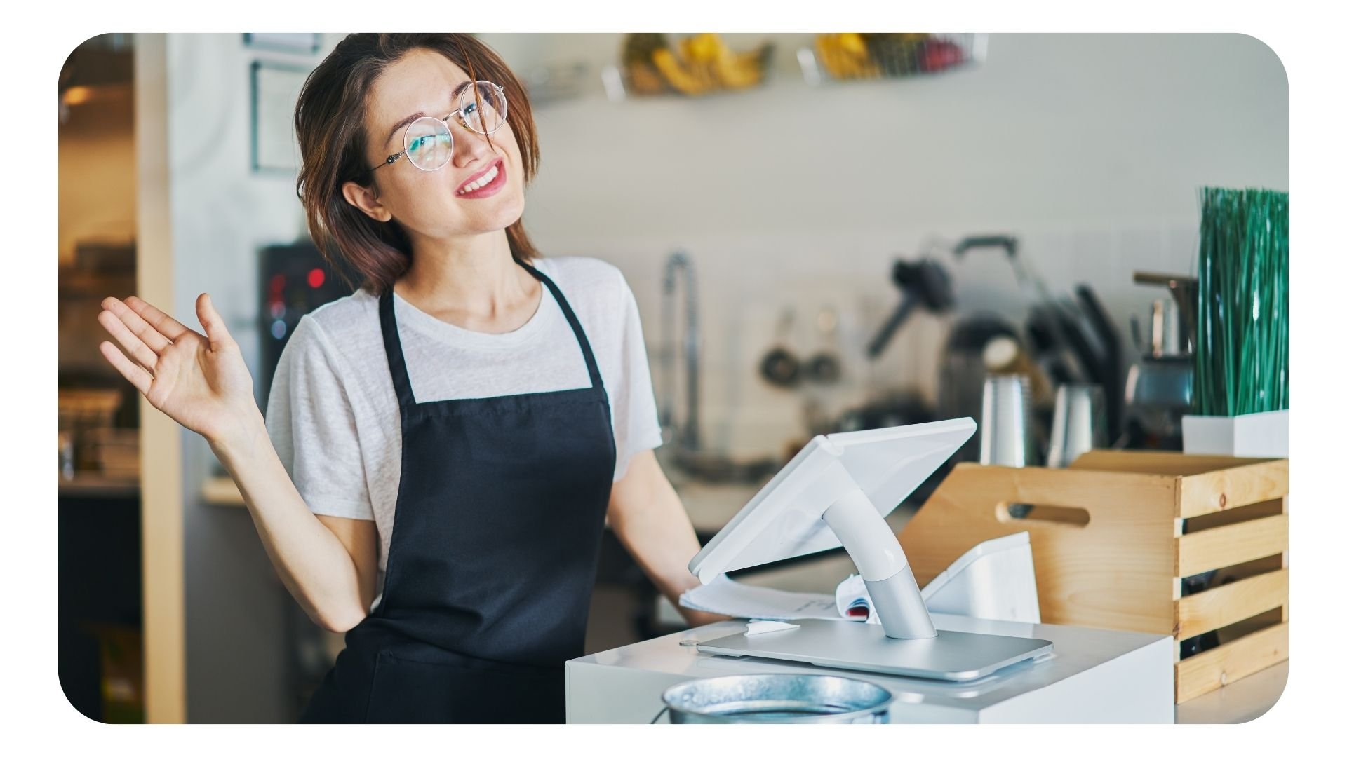 Restaurant worker looking organised and satisfied