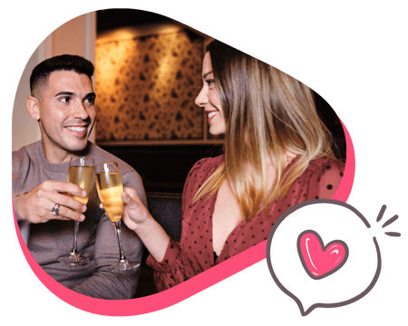 Couple enjoying a glass of champagne on Valentine's Day